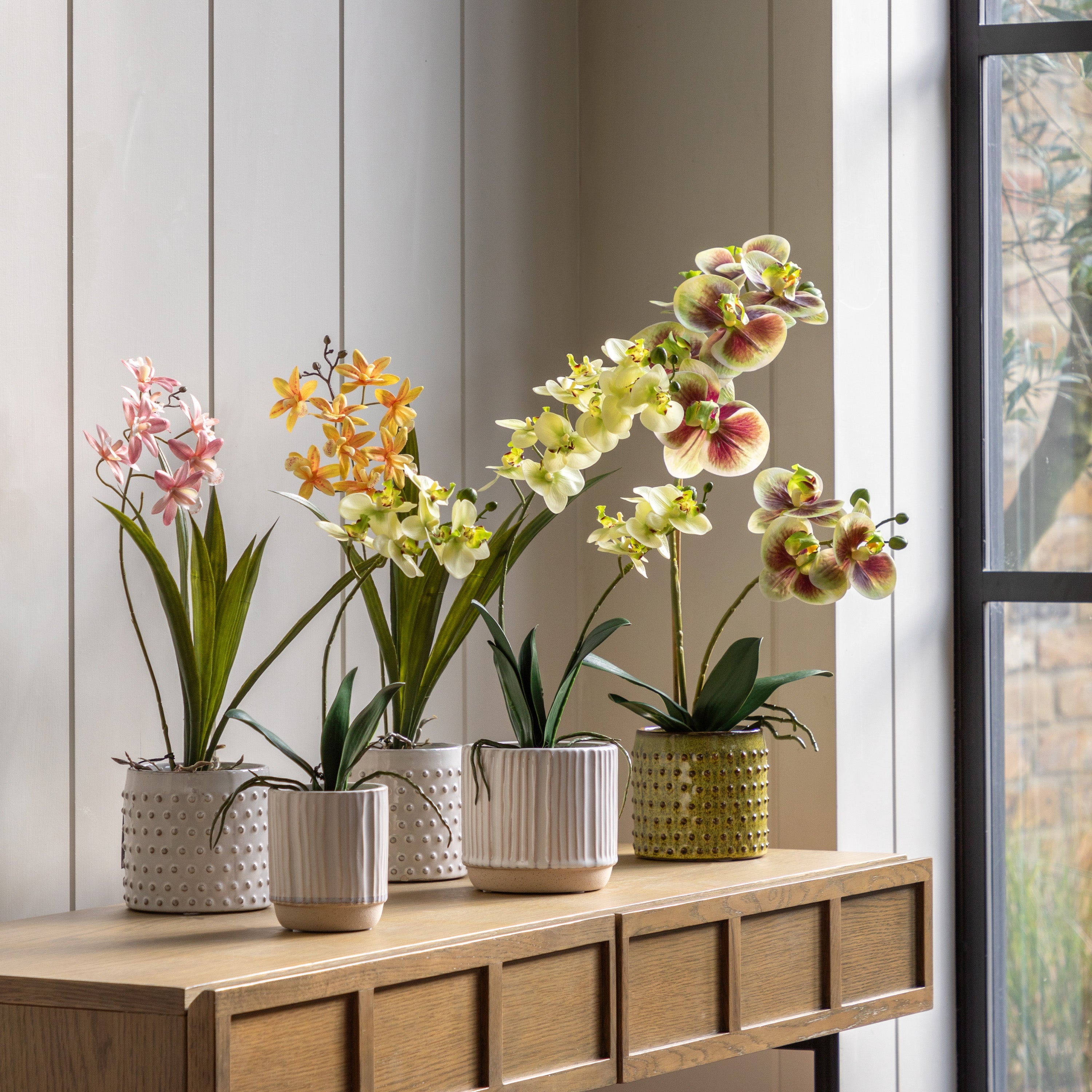 Artificial Orchid Cream in Ribbed White Ceramic Pot | Large